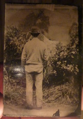 Rare Tintype Early Photograph Man Standing Backside To Camera Backwards Odd