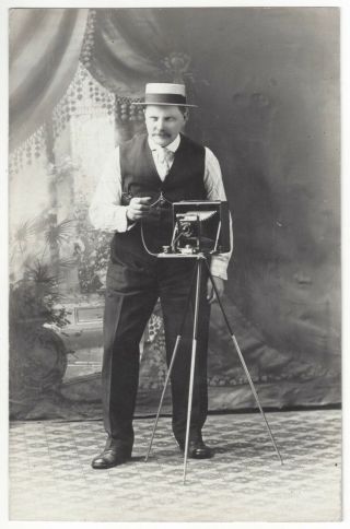 1910 Studio Real Photo Of Photographer Posing W/ Camera In Photo Studio