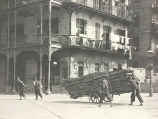 1925 PHOTO POST CARD OF HONG KONG: STREET SCENE/CART WITH RATTAN 2