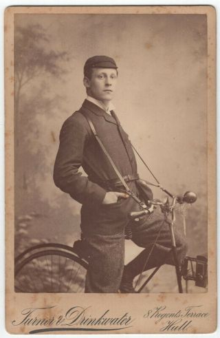 Cc: Portrait Young Man On Bicycle With Unusual Harness Attached To Handlebars