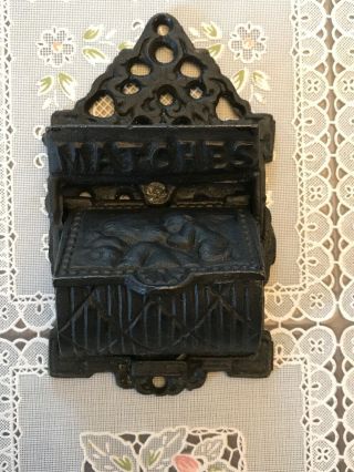 Cast Iron Match Holder With Venus And Cupid Hinged Lid Wall Mount