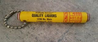 Vintage Quality Liquors Advertisement Keychain Calendar Toothpick Holder
