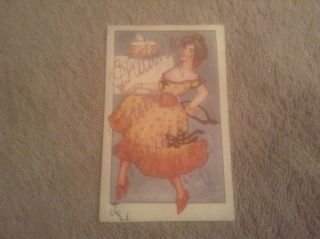 Vintage Postcard Of A Woman In Glitter In " The Cake Walk "