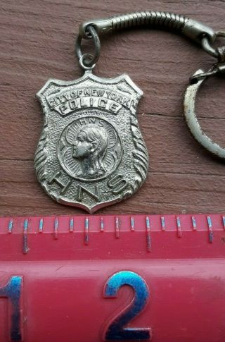Commemorative Communion Mass and Breakfast March 23,  1969 NYPD key chain badge 2