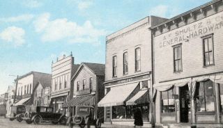 C1915 - 1930 Angola,  Ny,  Commercial Street Store Fronts Sky Tint Postcard