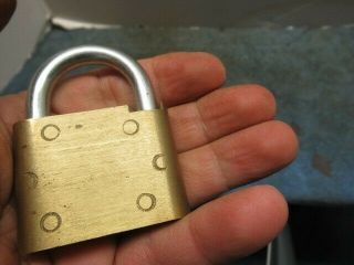 old brass padlock lock MAGIC with a key.  n/r 3