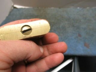 old brass padlock lock MAGIC with a key.  n/r 4