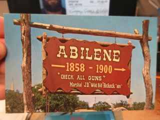 Vintage Old Postcard Kansas Abilene Wild Bill Hickok Check All Guns Sign Notice