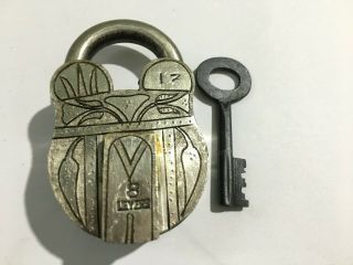 An Old Or Antique Brass Padlock With Key Collectible Carving All Over The Lock
