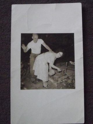 Man Spanking Mature Woman Leaning Over In The Garden Vtg 1940 