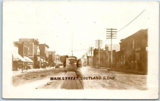 Scotland South Dakota Rppc Real Photo Postcard Main Street W/ Added Trolley 1912
