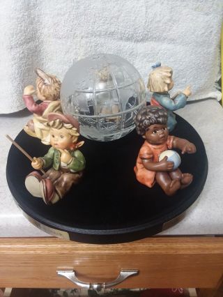 Hummel Goebel Around The World Figurines With Stand And Glass Map