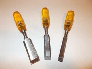 $reduced$ Three Stanley Yellow Handle Chisels 1 " : 3/4 " : And 1/2 "