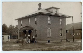 1910 Family In Front Of Brick House,  Fremont,  Indiana,  Real Photo Postcard Rppc