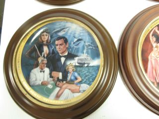 James Bond Limited Edition Fine Porcelain Franklin Plates - 6 w/ wood frames 7