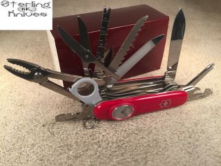 3 - 1/2 " Closed Victorinox Switzerland Time Keeper Red Champ Knife Stainless