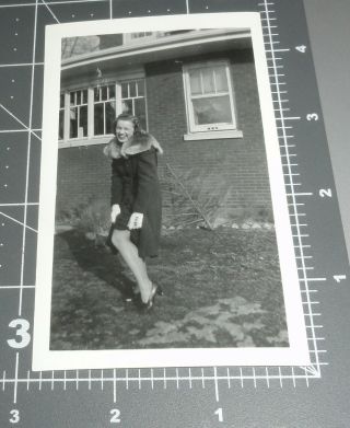 Woman Lifts Skirt Shows Off Leg 1940 