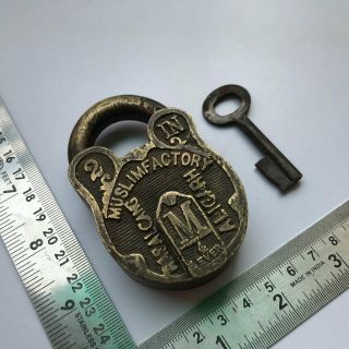 An old antique solid brass padlock lock with key and carving 3
