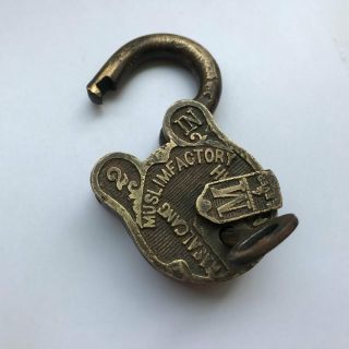 An old antique solid brass padlock lock with key and carving 4