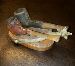 Cast Iron Spur Pipe Holder With 2 Leather Wrapped Pipes
