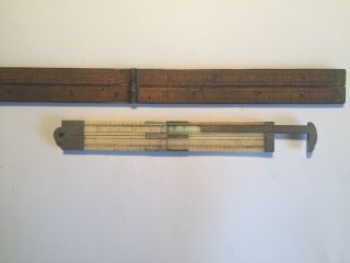 Antique folding rulers: 2 12 and 24 inch ivory 39 and wood 62 2