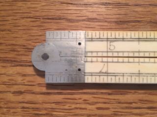 Antique folding rulers: 2 12 and 24 inch ivory 39 and wood 62 8