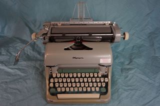 1960s Green Olympia SG1 Typewriter in great safe 5