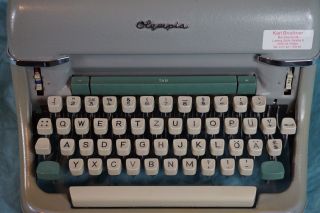 1960s Green Olympia SG1 Typewriter in great safe 6