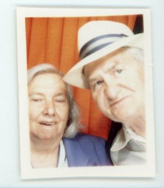 Older Couple Posing Together In Photobooth Vintage Color Snapshot Photo Booth