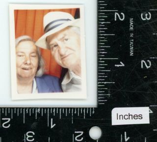 Older couple posing together in Photobooth vintage color snapshot photo booth 2