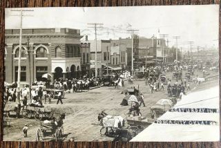 8/15 Rppc A Saturday In Ponca City Oklahoma Pm 1910 Advertising Carts Umbrellas