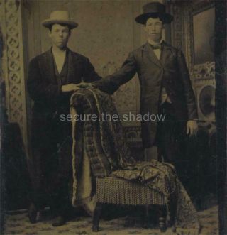 Tintype: Two Affectionate Young Men Brothers? In Hats Holding Hands Beside Chair