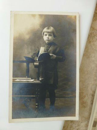Rppc Id Page Boy Hair Little Boy W Book By Bench Antique Real Photo Postcard