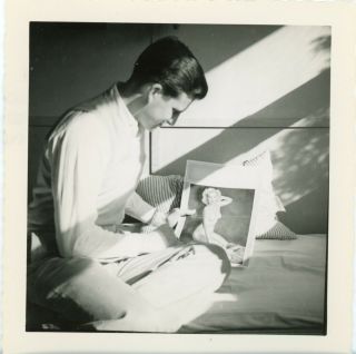 Vintage Snapshot - Young Man With A Grin Admiring His Photo Of Naked Woman