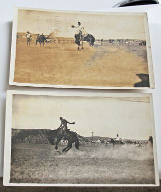 2 Vintage Real Photo Post Card Saddle Bronc Ride Rodeo Rock Springs Wyoming