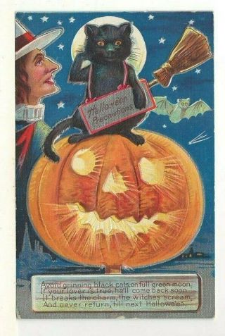 C1910 Halloween Postcard: Large Pumpkin,  Black Cat Holding A Broom,  Witch & Bat