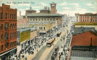 1910 Colorado Postcard: Trolleys & Shops On North Main Street,  Pueblo,  Co