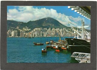 Hong Kong - Central District - View From Kowloon.  Boats.  Cheng Ho - Choy Photo.