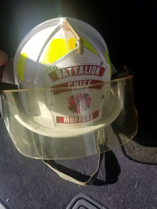 Cairns 1010 Moffett Battalion Chief Helmet.  Tinted Amber Visor.