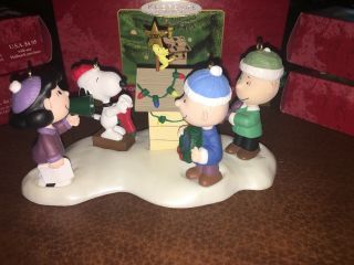 A Charlie Brown Christmas Hallmark Ornament Set With Snoopy Doghouse & Woodstock