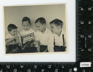 Boys reading book - all about dinosaurs Vintage color snapshot photo 2