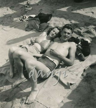 Looking Down On Affectionate Swimsuit Couple With Feet In The Camera 1942 Photo
