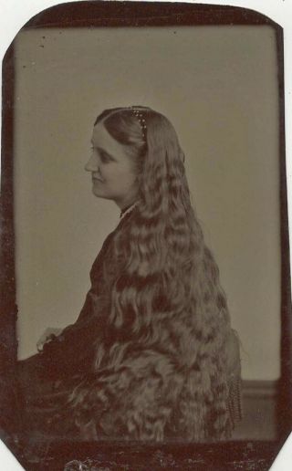 Portrait Tintype Of A Girl Showing Off Her Long,  Long Hair