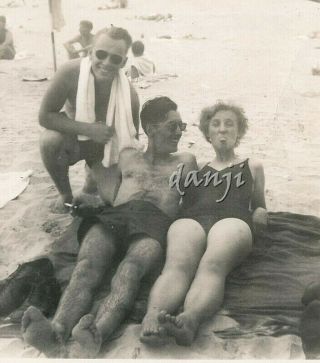 Swimsuit Man Over Couple W Feet In Camera,  Girl Sticking Tongue Out 1953 Photo