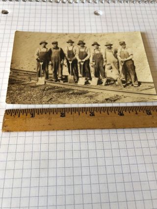 Vintage Azo Rppc Men W/hats Shovels Train Track Postcard