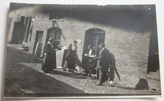 Unusual Vintage 1900s Real Photo Post Card Victorian People Lunch Break In Alley