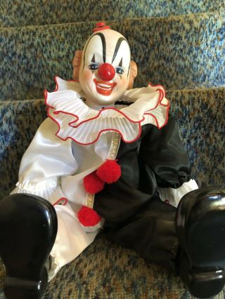 Vintage Porcelain Clown Musical Doll In Red,  Black And White With Red Pompoms