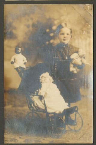 1910 Rppc,  Little Girl W/2 Dolls,  Teddy Bear & Carriage,  One Black Doll