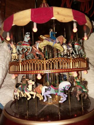 mr christmas merry go around carousel horses lights music double decker 2
