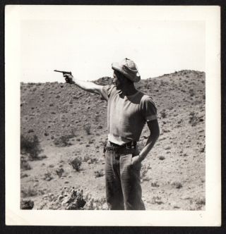 Raggedy Clothes Hippy Man Aims Hand Gun In Desert 1950s Snapshot Photo
